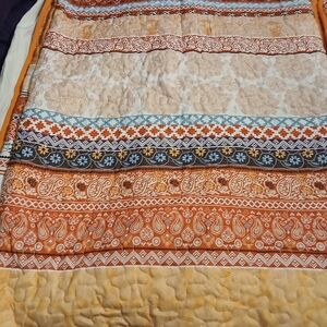 Elegant Orange and Cream Paisley Quilt